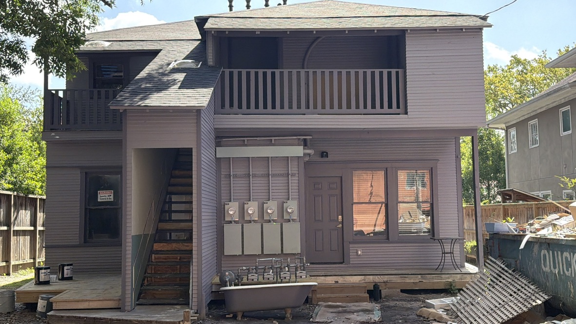 Completed rear staircase and second-level addition in The Heights