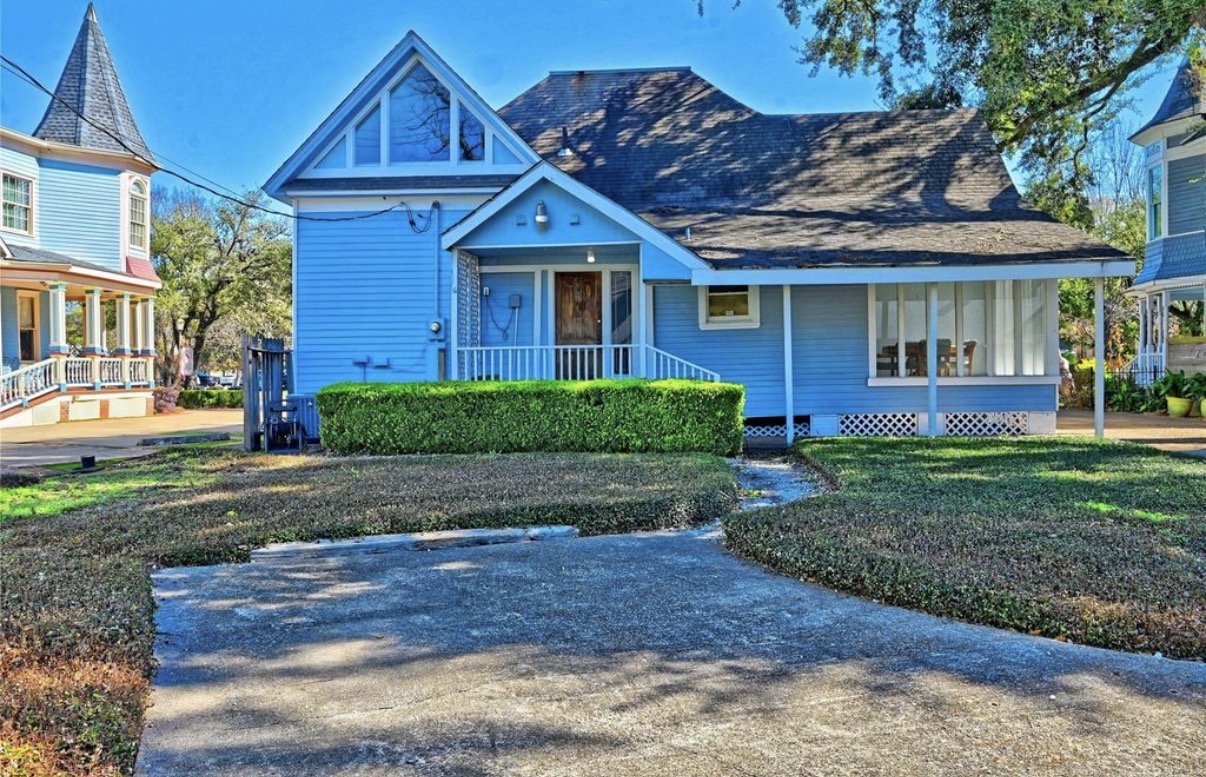Blue house before exterior remodeling, front view