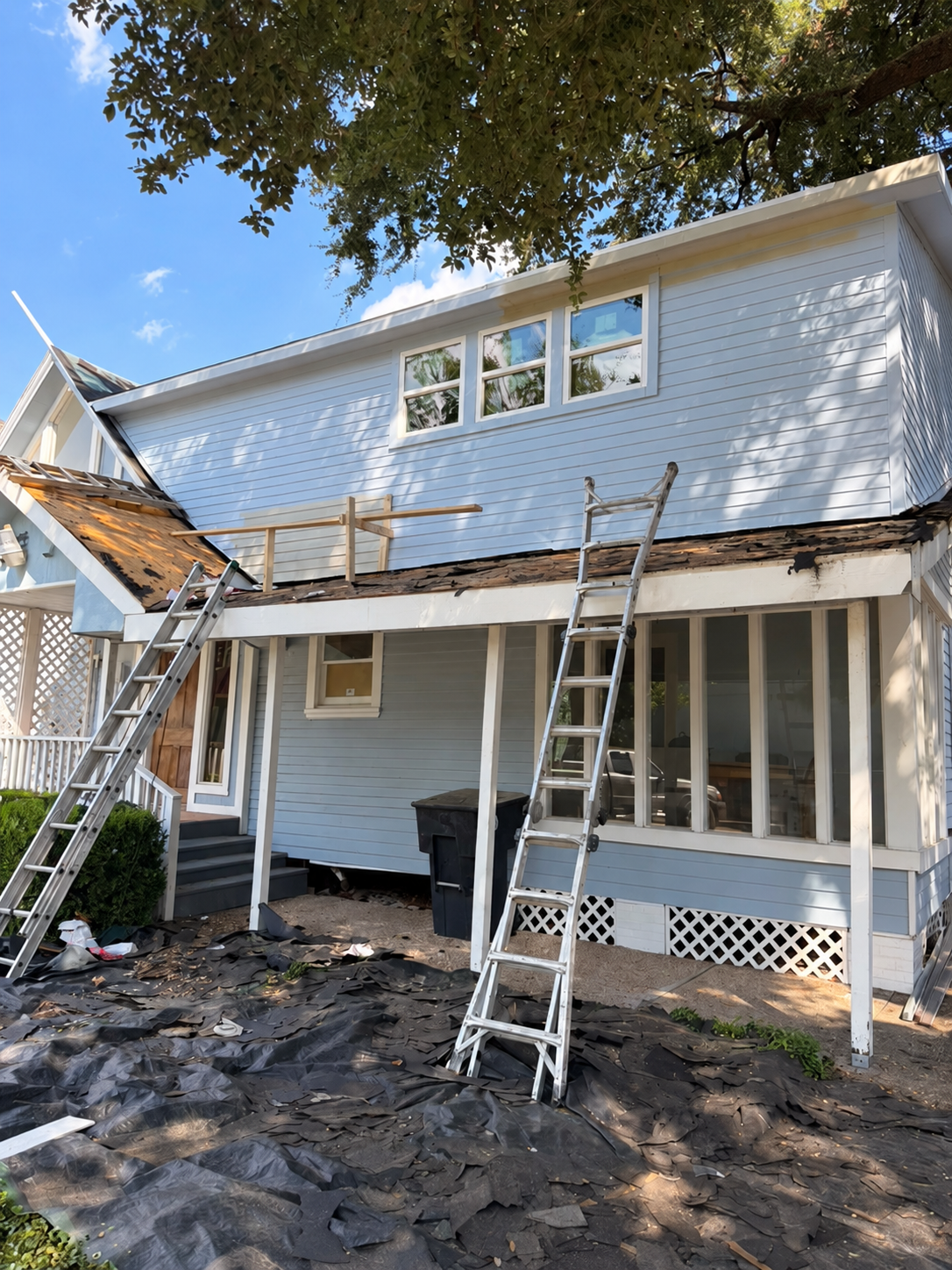Rear second-level addition during exterior remodeling