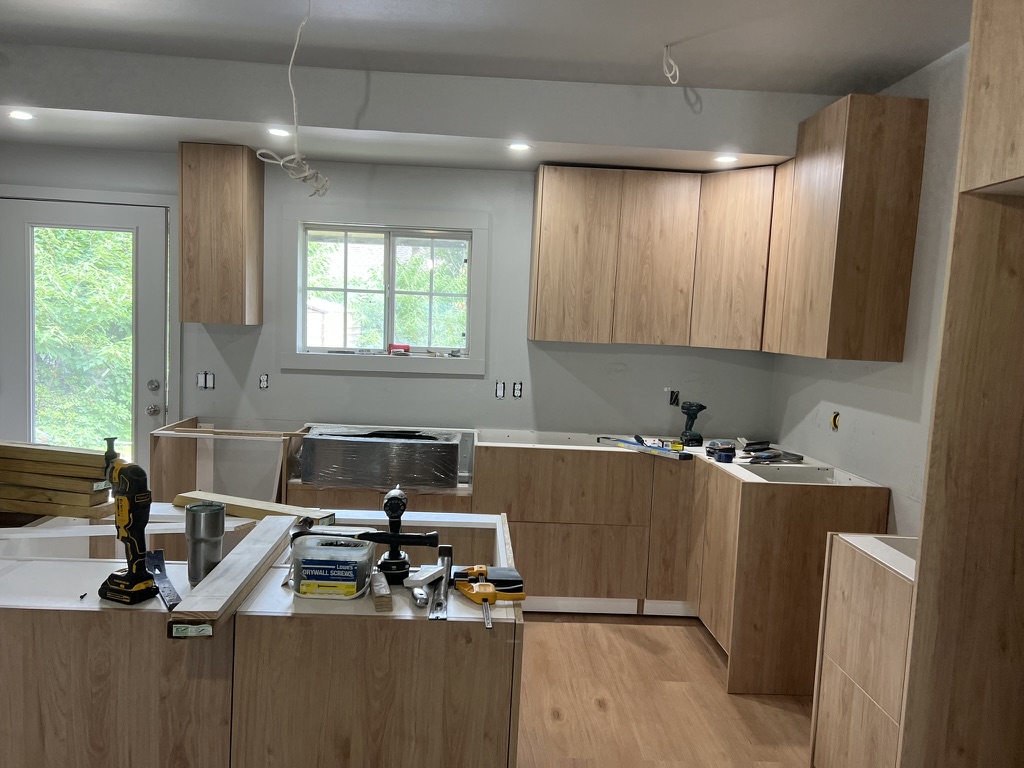 Kitchen remodeling in advanced progress with cabinets installed